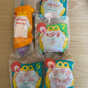 1996 & 1997 McDonalds Happy meal toys, Hercules, beetle borgs, sleeping beauty, 101 Dalmatians and hot wheels