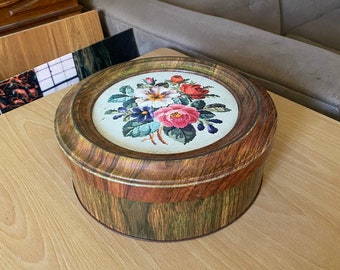 Guildcraft 10.5” large sewing round tin -  made of metal but has wood and floral needlepoint look