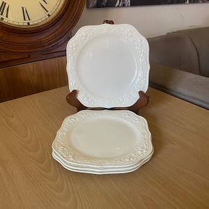 Set of 4 homer Laughlin eggshell theme salad plates