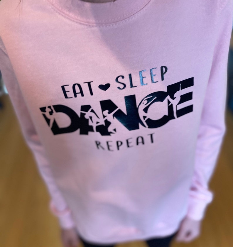 In sizes 3-13 years Dance Sweatshirt Baby Pink Dancewear for keeping warm on way to studio Maybe out with friends whilst limbering up