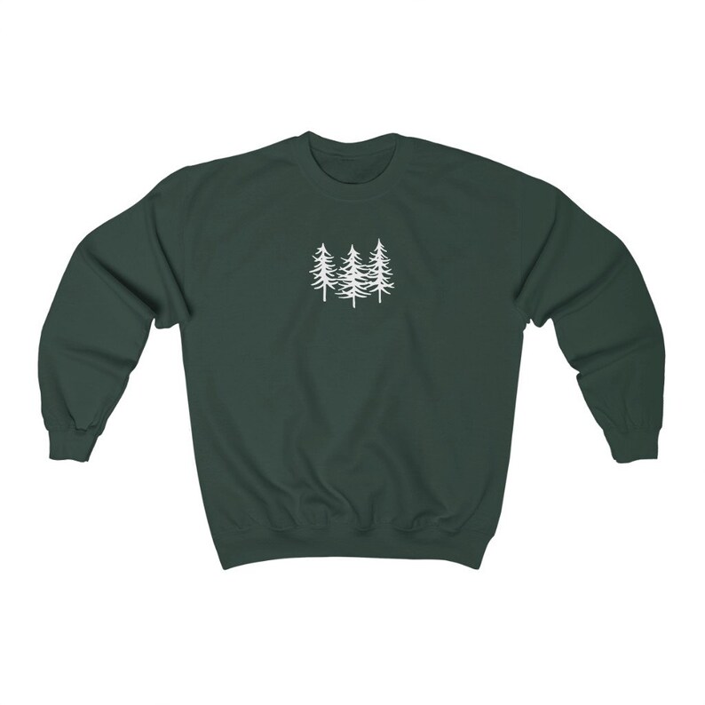 May include: A dark green sweatshirt with a white outline of three pine trees on the front.