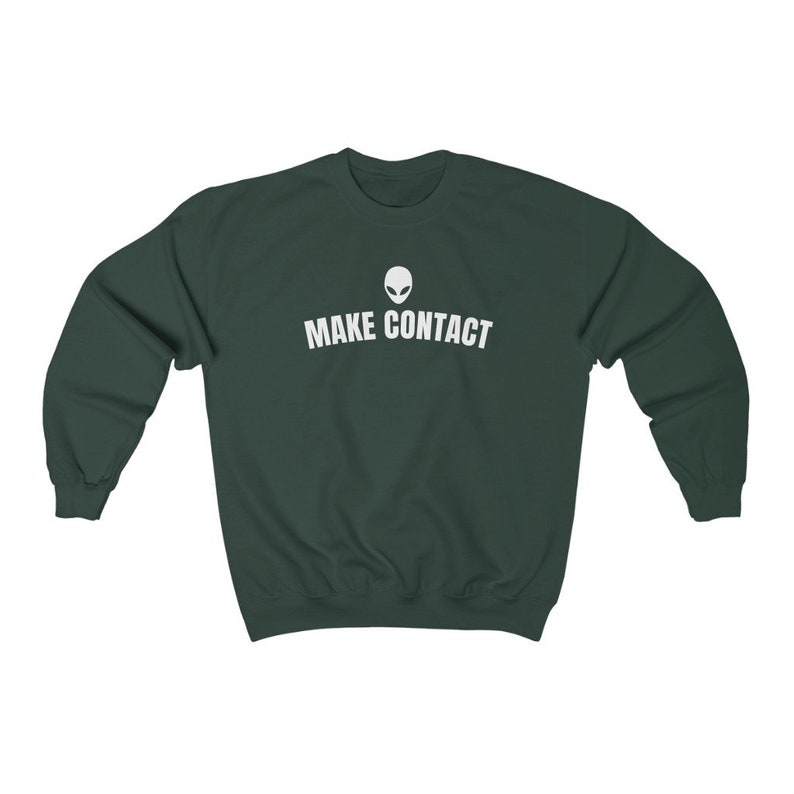 May include: A dark green sweatshirt with a white alien head graphic and the text "MAKE CONTACT" printed on the front.