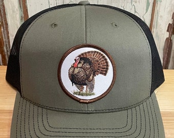 Gorra Trucker Con Parche De Pavo Salvaje Loden/Negro