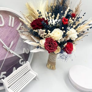 Dried flower wedding bouquet in burgundy, ivory and navy blue tones – rustic boho bridal bouquet with berries and lavender