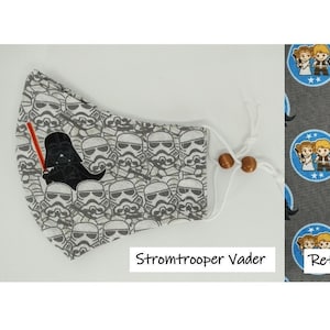 May include: Three different fabric designs featuring Star Wars characters. The first design is a black and white pattern of Stormtroopers and Darth Vader. The second design is a gray background with blue circles featuring various Star Wars characters. The third design is a black background with colorful Star Wars characters and spaceships.