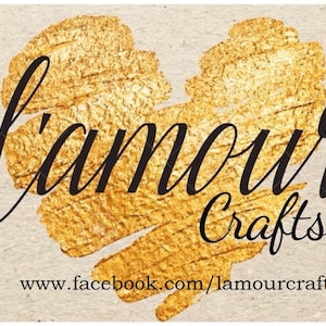 May include: A gold heart-shaped graphic with the text "l'amour Crafts" and the website address "www.facebook.com/lamourcrafts18" below. A blue Facebook icon is in the bottom left corner.