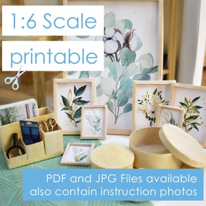 May include: A set of printable 1:6 scale miniature picture frames with watercolor floral designs. The frames are made of wood and come with instructions for assembly. PDF and JPG files are available.