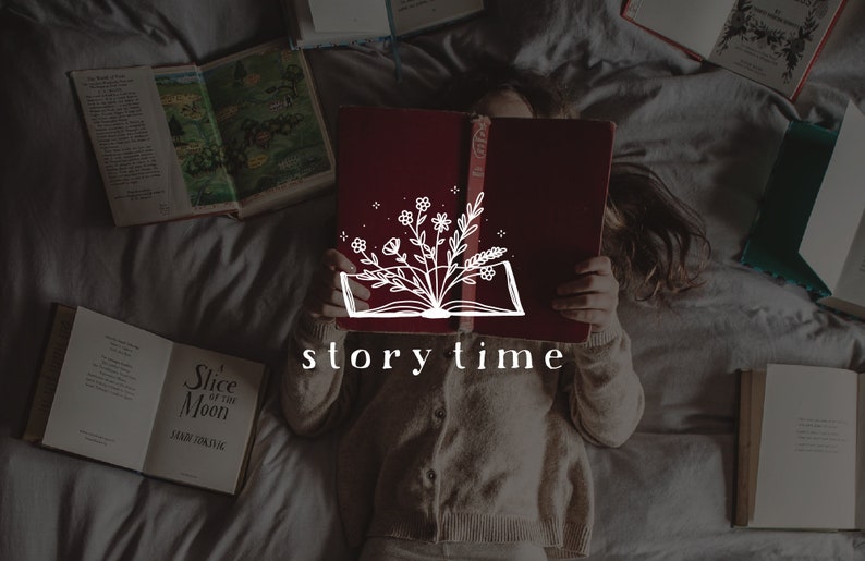 May include: A person lying on a bed with a red book open in their lap. The book has a white illustration of an open book with flowers growing out of it. The text "story time" is written below the illustration.