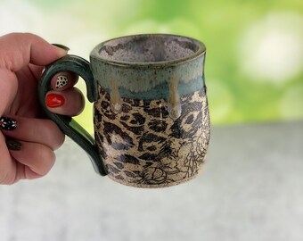 Stoneware Mug, Speckled Clay, leopard print and contrasting peony design, teal rim. coffee cup, tea mug, bold pattern, unique gift.