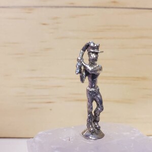 Pewter Miner on top of Calcite Crystal