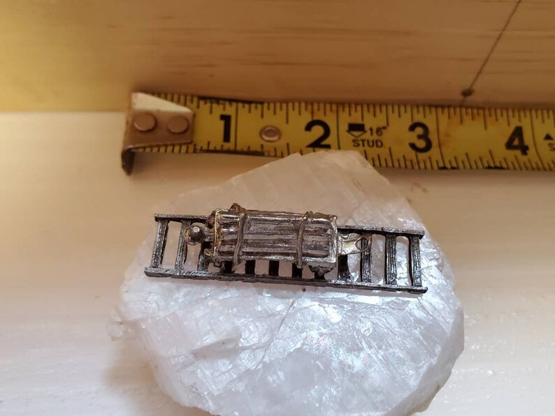 Pewter Railcar on top of Calcite Crystal