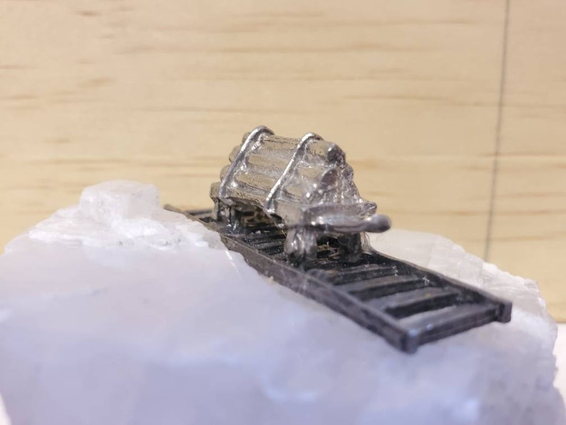 Pewter Railcar on top of Calcite Crystal
