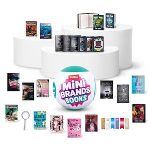 May include: A collection of miniature books, including titles like "Goosebumps" and "Dog Man," displayed on white pedestals. A ZURU Mini Brands Books ball is in the center. A magnifying glass and bookmarks are also present.