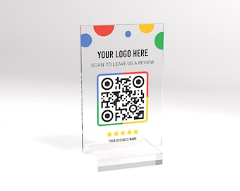 Puede incluir: Un letrero de acrílico transparente con un diseño de lunares de colores. El letrero dice "Su logotipo aquí" y "Escanee para dejarnos una reseña". Presenta un código QR en blanco y negro y cinco estrellas doradas. La parte inferior del letrero dice "Su nombre comercial".