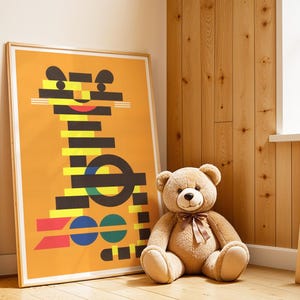 May include: An orange framed art print with a geometric tiger design, a brown teddy bear with a ribbon, and a wooden ladder-style shelf. The art print features black, yellow, red, and blue shapes. The bear is sitting on the floor.