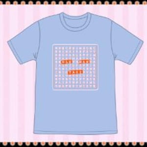 May include: A pale blue t-shirt with a crew neck and short sleeves. The shirt has a square graphic in the centre with the words "OLD MAN YAOI" in orange letters within a grid of letters.