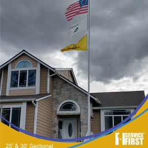 May include: A house with a brown and stone exterior, with a sectional flagpole flying three flags: an American flag, a white flag with green text, and a yellow flag. The flagpole is 25' and 30' sectional. The text "SERVICE FIRST" is visible in the lower right corner of the image.