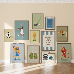 May include: A collection of framed art prints featuring sports themes. The prints include a soccer ball, a tennis player, a golf club, a tennis court, a lion playing soccer, a trophy, boxing gloves, a weight, a football helmet, a lion boxer, and a football player.