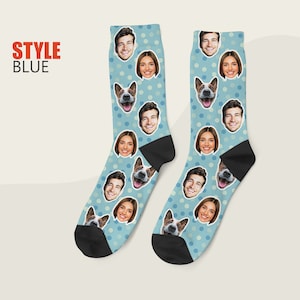 May include: A pair of blue socks with white polka dots and a repeating pattern of faces and a dog's face. The socks are made of a soft, comfortable material and are perfect for everyday wear.