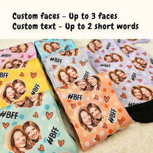 May include: A set of colorful socks with a polka dot pattern and hearts. Each sock features a custom photo of two people with the text "#BFF" printed on the sock.
