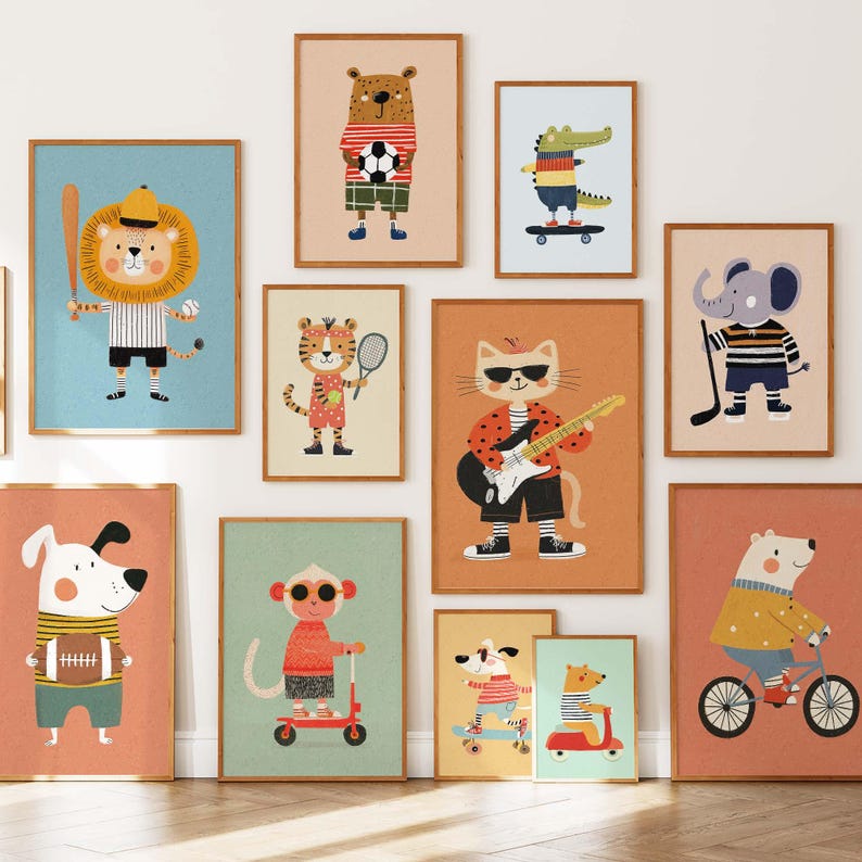 May include: A collection of framed art prints featuring cartoon animals engaged in various activities. The artwork includes a lion with a baseball bat, a bear with a soccer ball, a cat playing guitar, and a dog with a football.