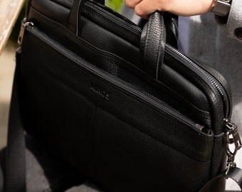 Sacoche élégante en cuir noir pour ordinateur portable : un indispensable pour les hommes stylés qui sont en déplacement !