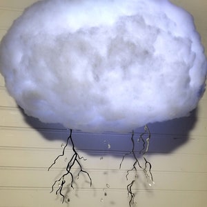 Cloud Lightning storm light up. Battery or plug in. Bluetooth speaker option. Nursery bedroom cloud decor. Multi color. Music and lights.