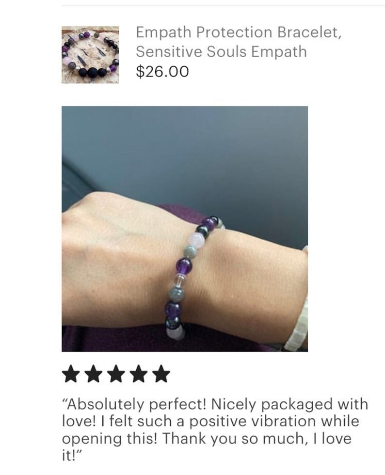 May include: A bracelet made with amethyst, rose quartz, black onyx, and grey hematite beads. The bracelet is on a person's wrist. "Absolutely perfect! Nicely packaged with love! I felt such a positive vibration while opening this! Thank you so much, I love it!"