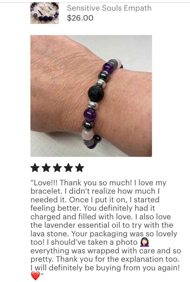 May include: A purple, grey, and black beaded bracelet with a lava stone bead. The bracelet is on a person's wrist. "Love!!! Thank you so much! I love my bracelet. I didn't realise how much I needed it. Once I put it on, I started feeling better. You definitely had it charged and filled with love. I also love the lavender essential oil to try with the lava stone. Your packaging was so lovely too! I should've taken a photo everything was wrapped with care and so pretty. Thank you for the explanation too. I will definitely be buying from you again!"