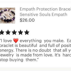 May include: A purple, black and grey beaded bracelet with a heart charm. The bracelet is described as an "Empath Protection Bracelet" and is priced at &pound;26.00. The product has a five-star rating and a customer review that says "I love everything you make. Each bracelet is beautiful and full of positive energy. There is no doubt that all your jewellery is made from love. It's hard to stop buying them."