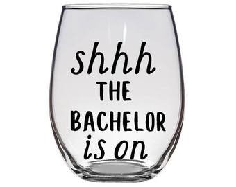 Shhh The Bachelor is on stemless wine glass / The Bachelor Wine Glass / Reality Tv Wine Glass / Funny Wine Glass / Television Show