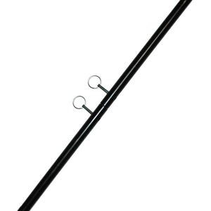 May include: A black metal bar with two small rings and a larger ring at each end. The bar is angled diagonally across a white background. The rings are silver and appear to be made of metal.