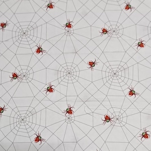 Remnant Halloween Fabric, 34 in x 42 in, White back ground with Red and Black Spiders on Grey Web, 100% Cotton, Masks