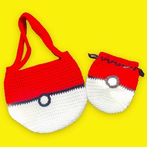 May include: Two crocheted bags in the shape of a Pokeball. The larger bag has a strap and the smaller bag is a drawstring pouch.