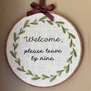 Funny Mounted Cross-Stitch - &quot;Welcome, please leave by nine&quot;