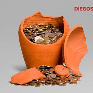 May include: A broken terracotta piggy bank overflowing with coins. The orange ceramic pot is shattered, with coins spilling out onto the surface. The logo "DIEGOS" is visible in the upper right corner.