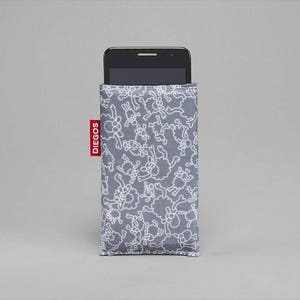 May include: A gray phone case with a white sheep pattern and the word "DIEGOS" printed in red on the side.
