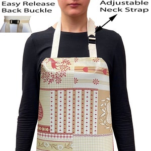 May include: A beige and red patchwork apron with a floral and bird design. The apron has an adjustable neck strap and an easy release back buckle.