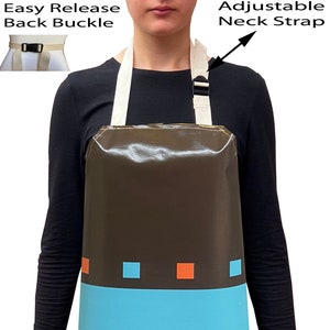 May include: A brown, waterproof apron with a colourful geometric pattern. The apron has an adjustable neck strap and an easy release back buckle.
