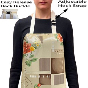 May include: A beige apron with a floral pattern and geometric shapes. The apron has an adjustable neck strap and an easy release back buckle.