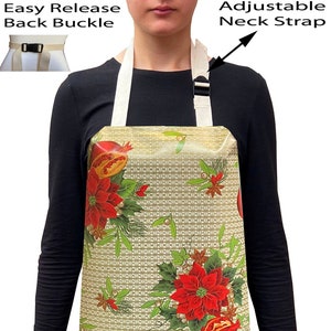 May include: A Christmas-themed apron with a red and green floral pattern. The apron has an adjustable neck strap and an easy release back buckle.