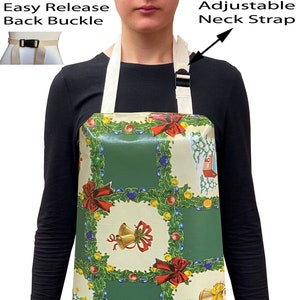 May include: A green and white Christmas-themed apron featuring a variety of festive images, including wreaths, bells, and Father Christmas. The apron has adjustable neck straps and an easy-release back buckle.