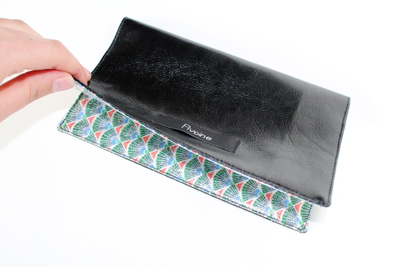 Glossy black checkbook