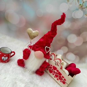 Red gnome with heart balloon in hand. Decor and gift for valentine&#39;s day. Gift For Him, Gift For Her.