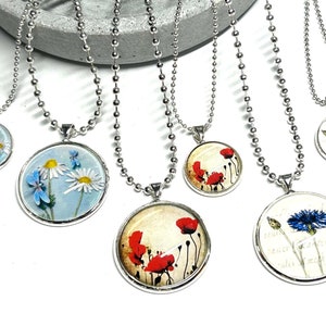 Necklace with pendant silver flower motifs poppy cornflower daisy with dragonfly