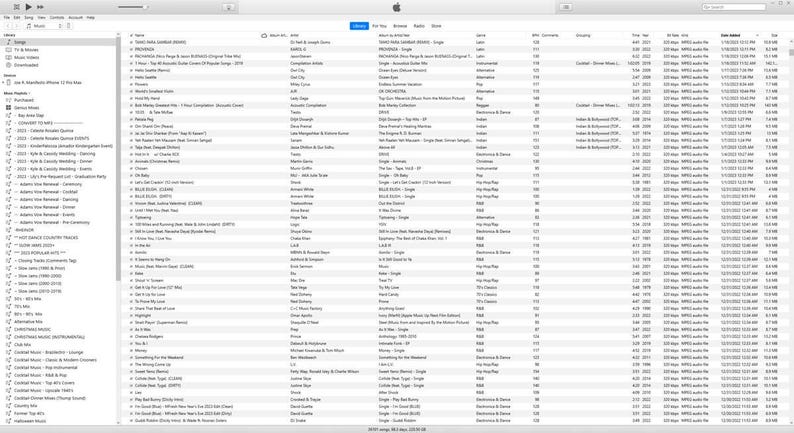 May include: Screenshot of an iTunes music library interface on a computer screen. The interface displays a list of songs, artists, albums, and other metadata. The screen is mostly white with black text and a gray menu bar at the top.