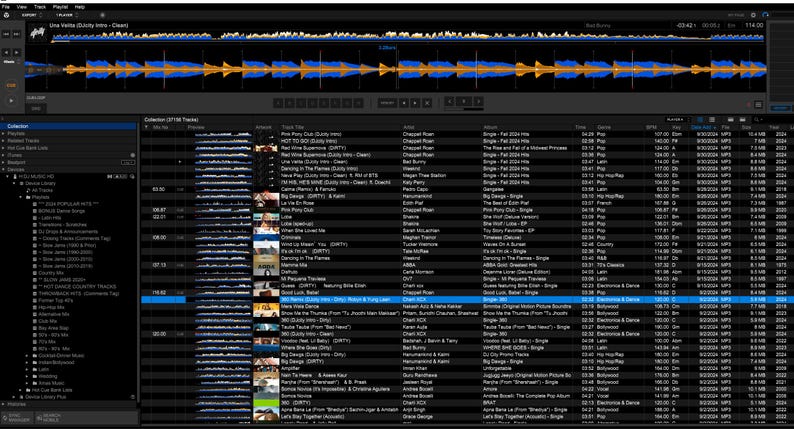 May include: A digital music management software interface displaying a collection of audio tracks in a list format. The screen features a waveform visualizer at the top, a sidebar for library navigation, and columns detailing track titles, artists, and metadata.