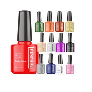 May include: A selection of Kinnd London nail polish bottles in diverse shades, such as red, green, orange, brown, gold, beige, silver glitter, purple, black, grey, blue, white, and pink. The red bottle displays the text "High Gloss Rapid Dry Nail Polish". Each bottle is 8ml.