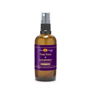 May include: A brown glass bottle with a black spray nozzle. The bottle is labelled "Aroma Energy Tea Tree & Lavender Oil Body Spray Contains Natural Essential Oils".