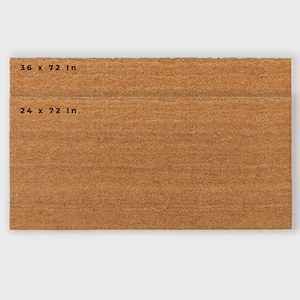 May include: A brown coir doormat with the dimensions 36 x 72 inches and 24 x 72 inches.